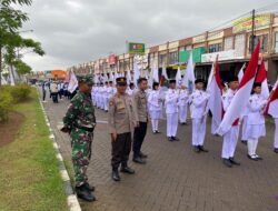 Polsek Cikupa Amankan Pawai Kirab Obor Porkab VI Kabupaten Tangerang Tahun 2025